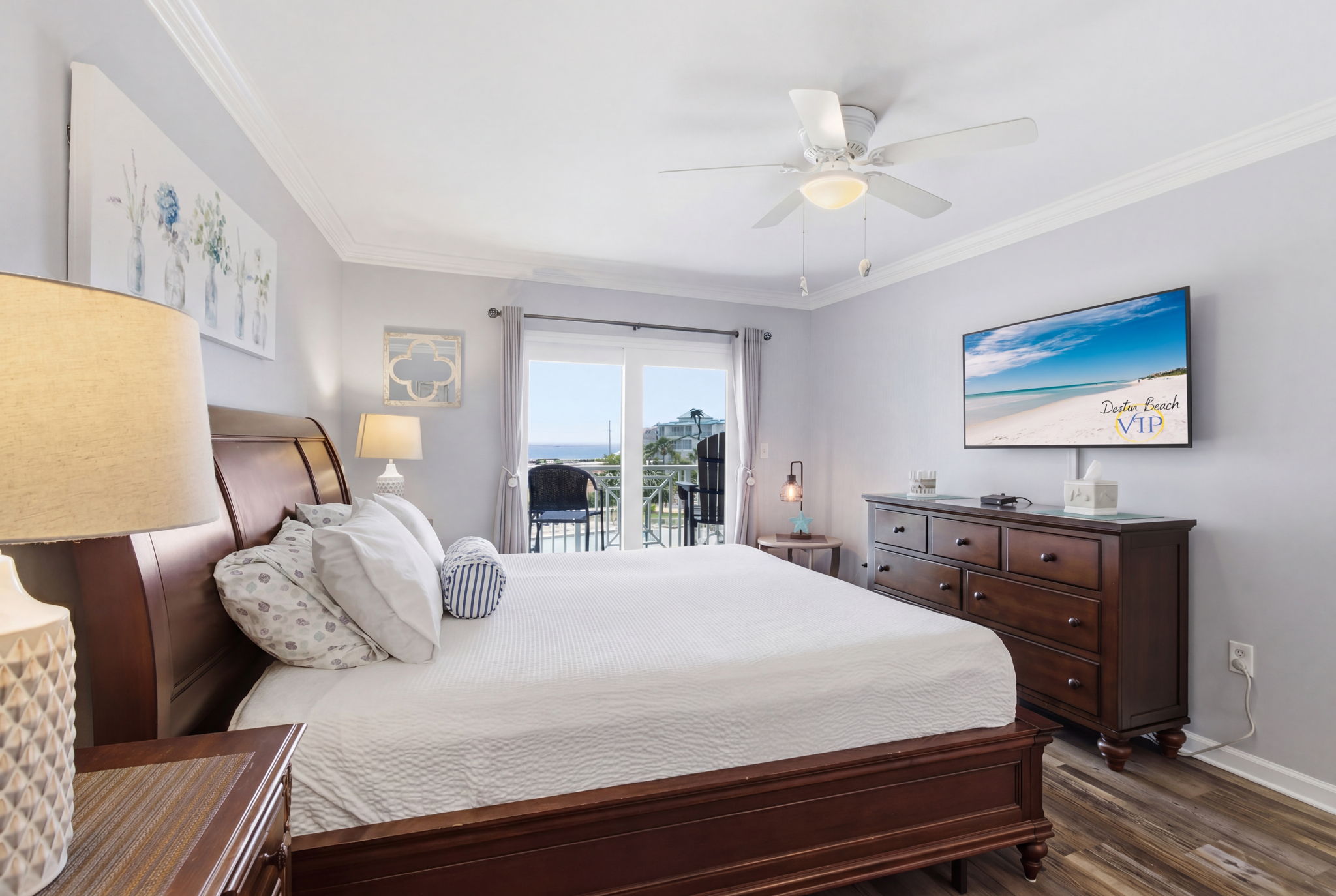 Primary bedroom with gulf view and balcony access
