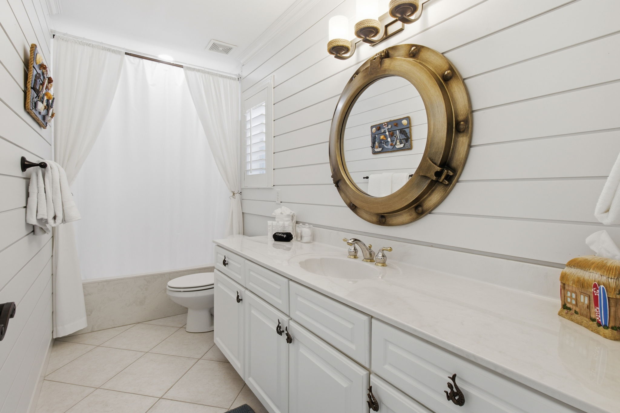 Second floor shared bathroom with hallway entrance