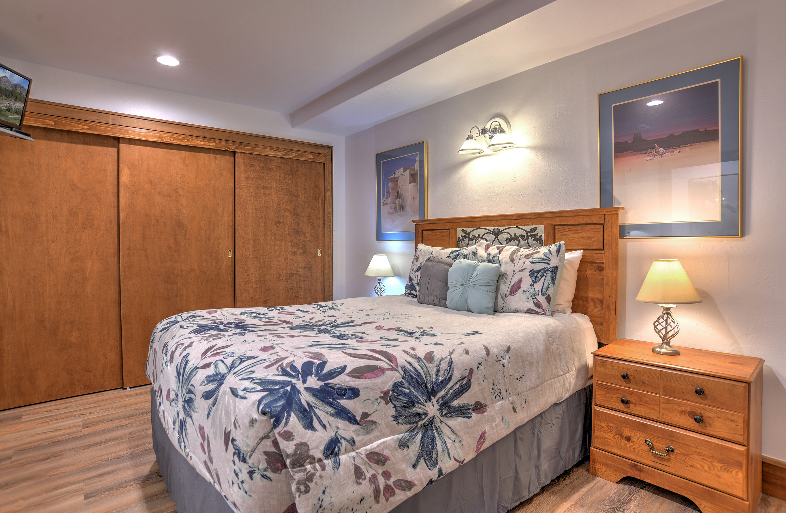 Relax and recharge in this cozy queen bedroom retreat.