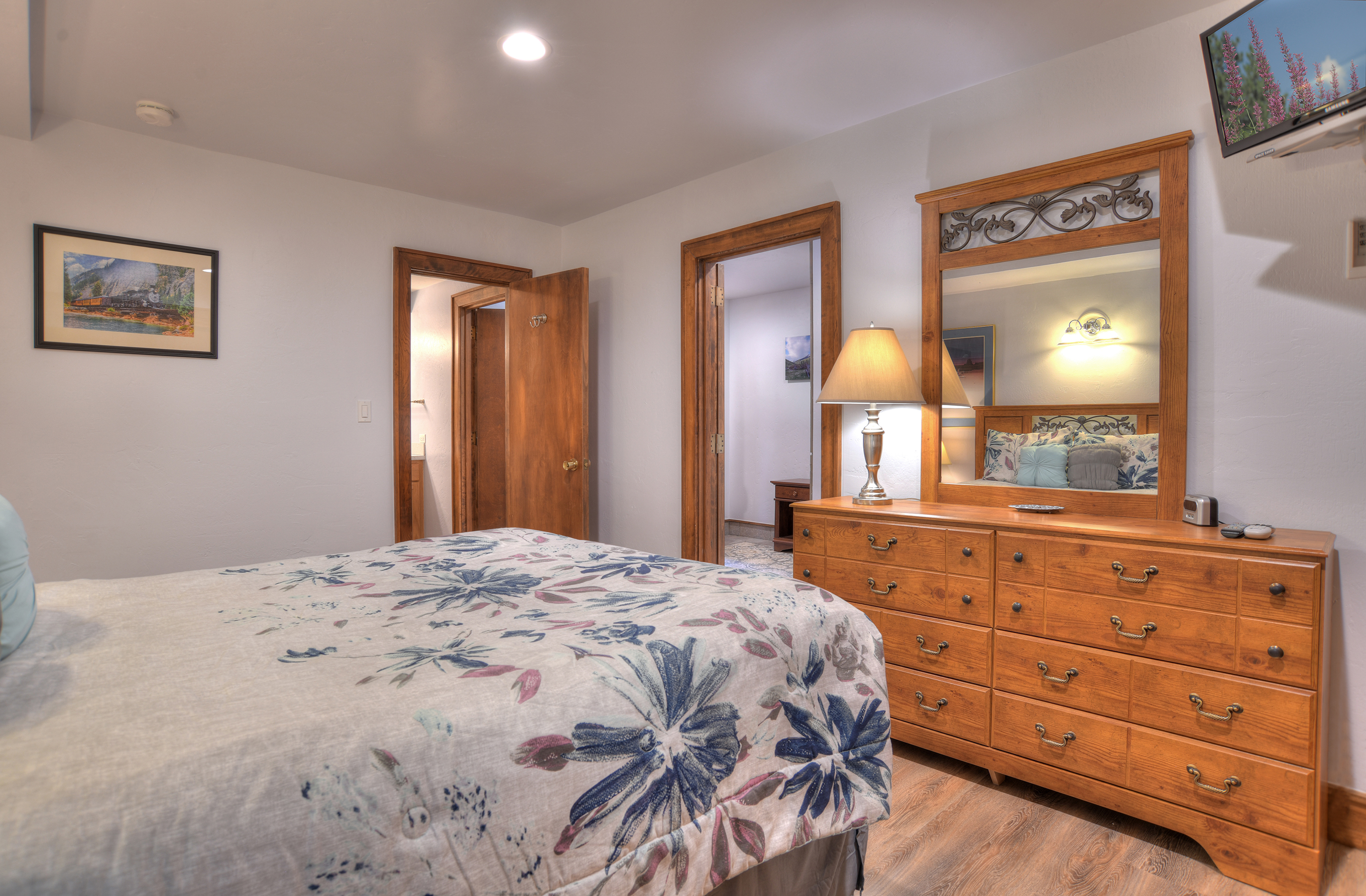 Relax and recharge in this cozy queen bedroom retreat.
