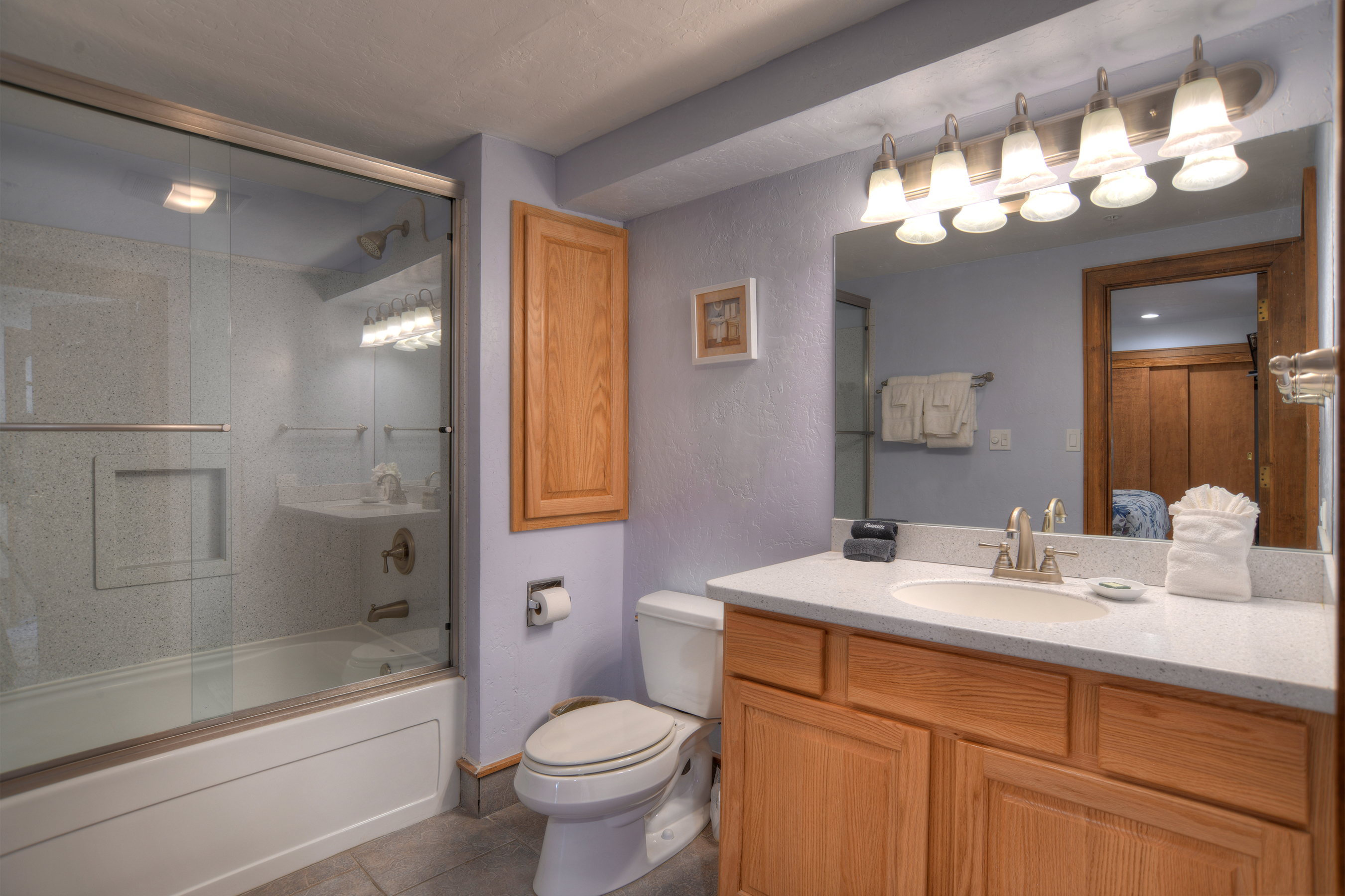 Clean and functional bathroom featuring a tub/shower combination.