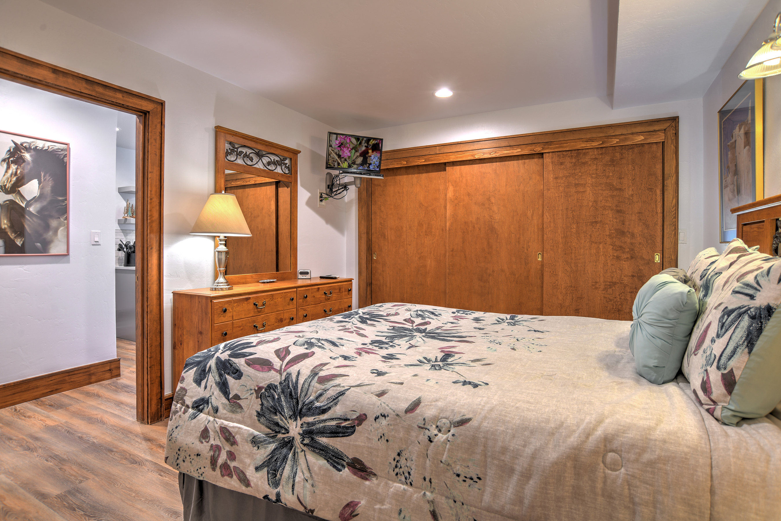 Relax and recharge in this cozy queen bedroom retreat.