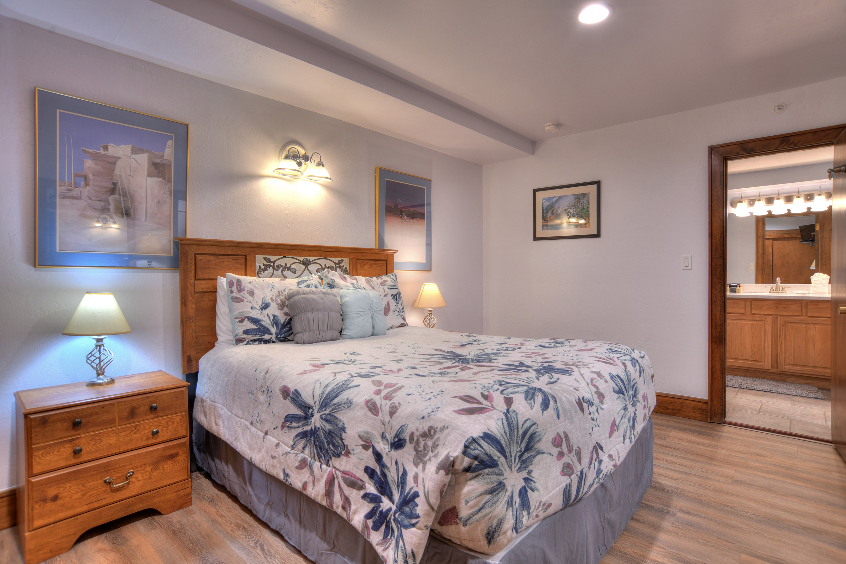 Relax and recharge in this cozy queen bedroom retreat.