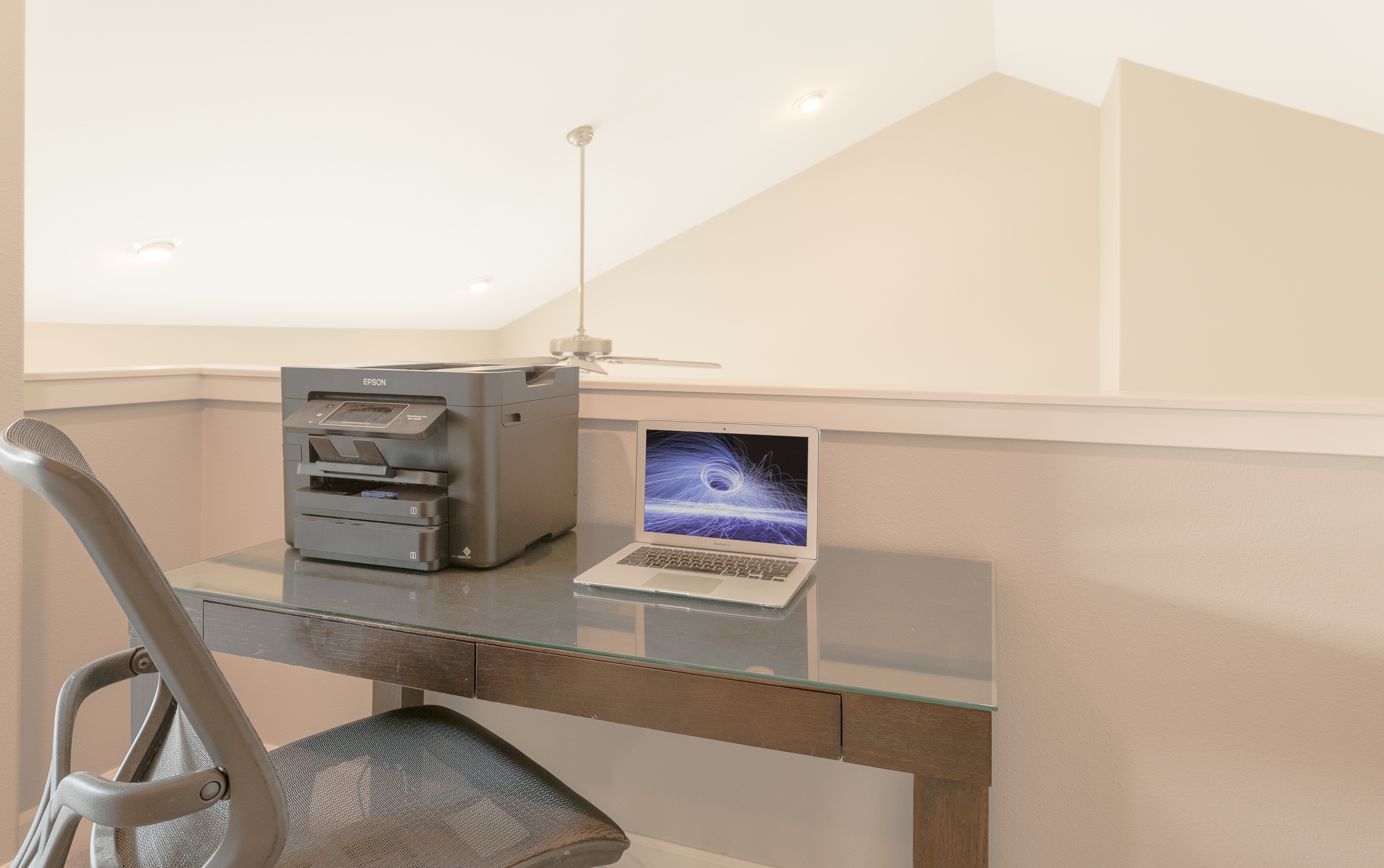 Work space with desk and chair. 