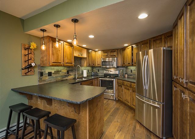 Completely Updated Condo with Mountain Views - Heated Pool- Stunning Views! 8