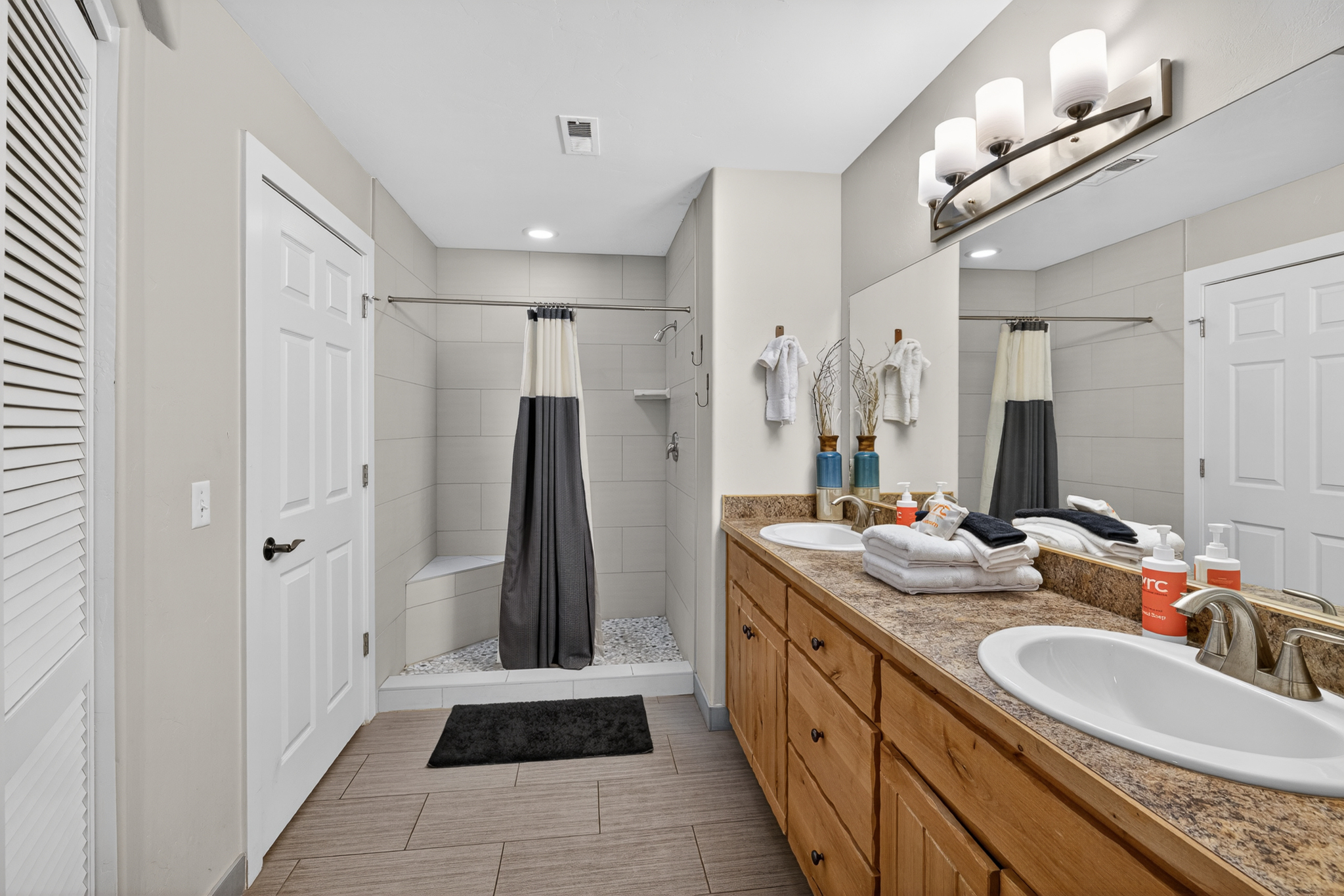 Master bathroom with shower and walk in closet