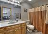 Second bathroom with tub/shower combo