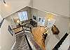 View of entry and formal living space from upstairs