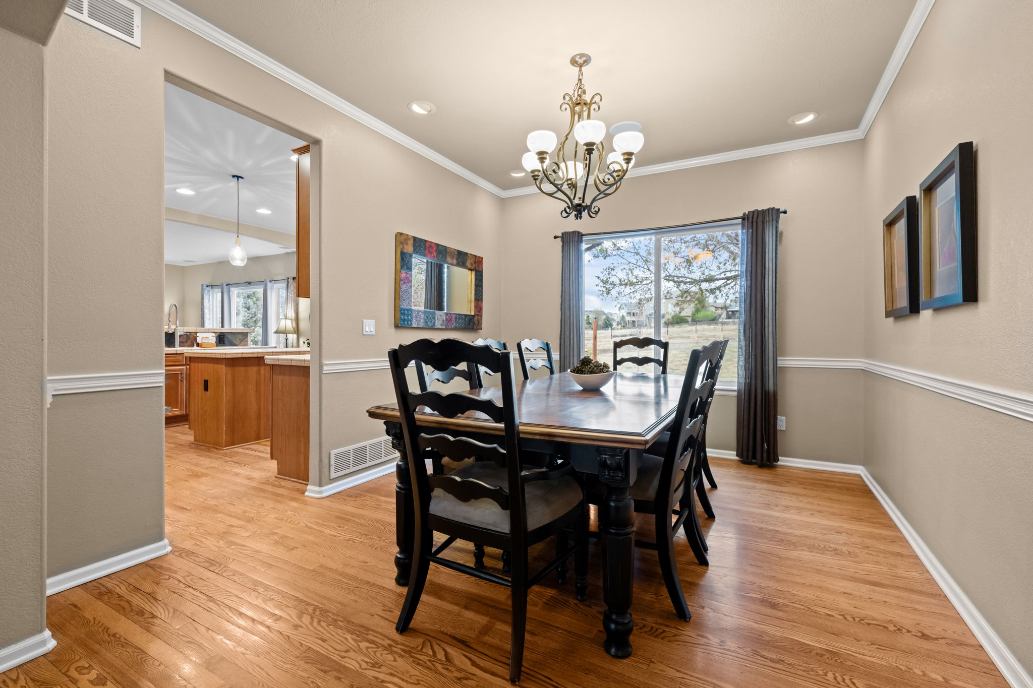 Formal dining room with comfortable seating for 8