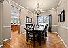 Formal dining room with comfortable seating for 8