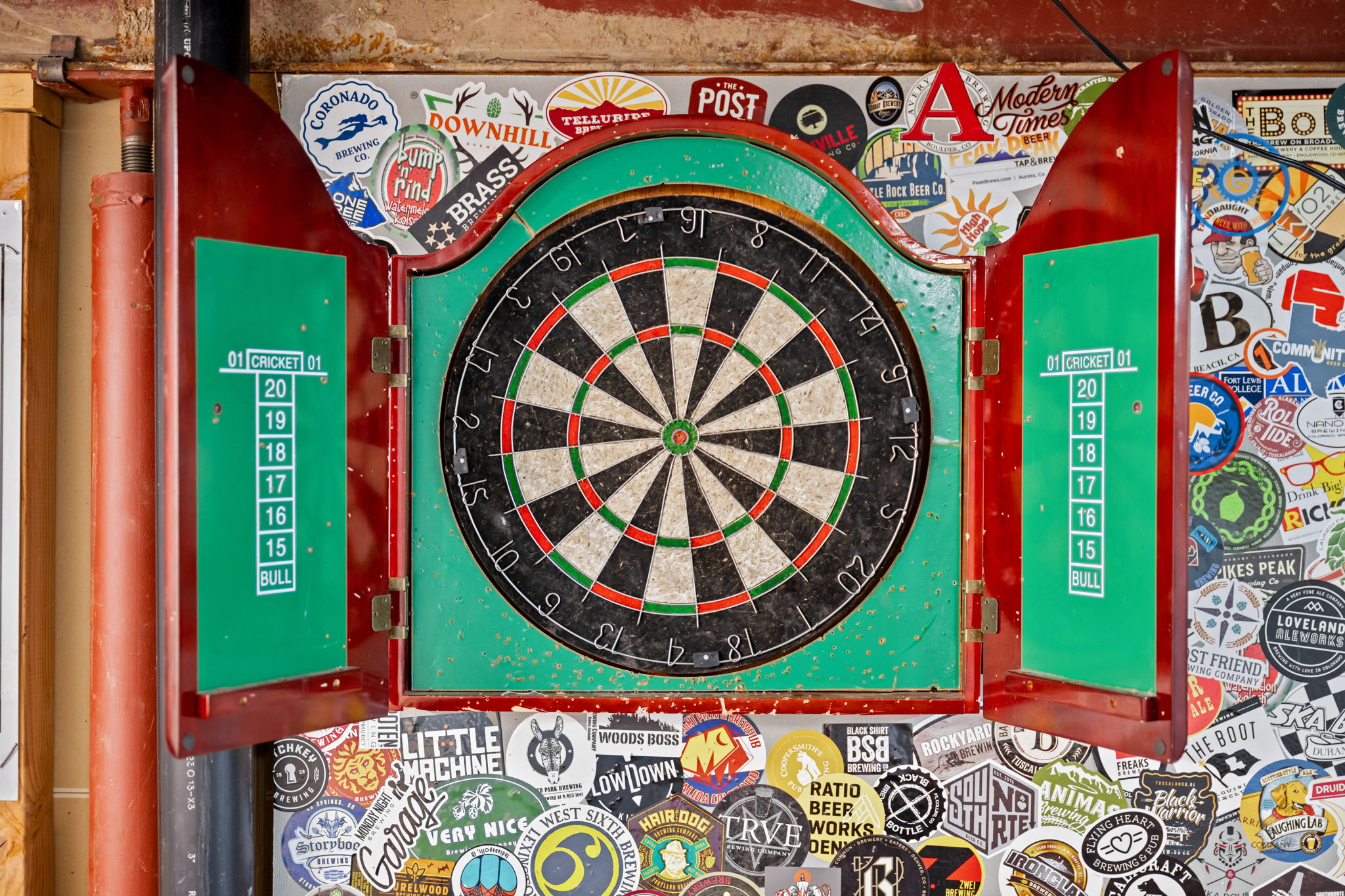 Dartboard in unfinished basement
