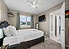 3rd upstairs bedroom, queen bed with TV, jack and jill bathroom