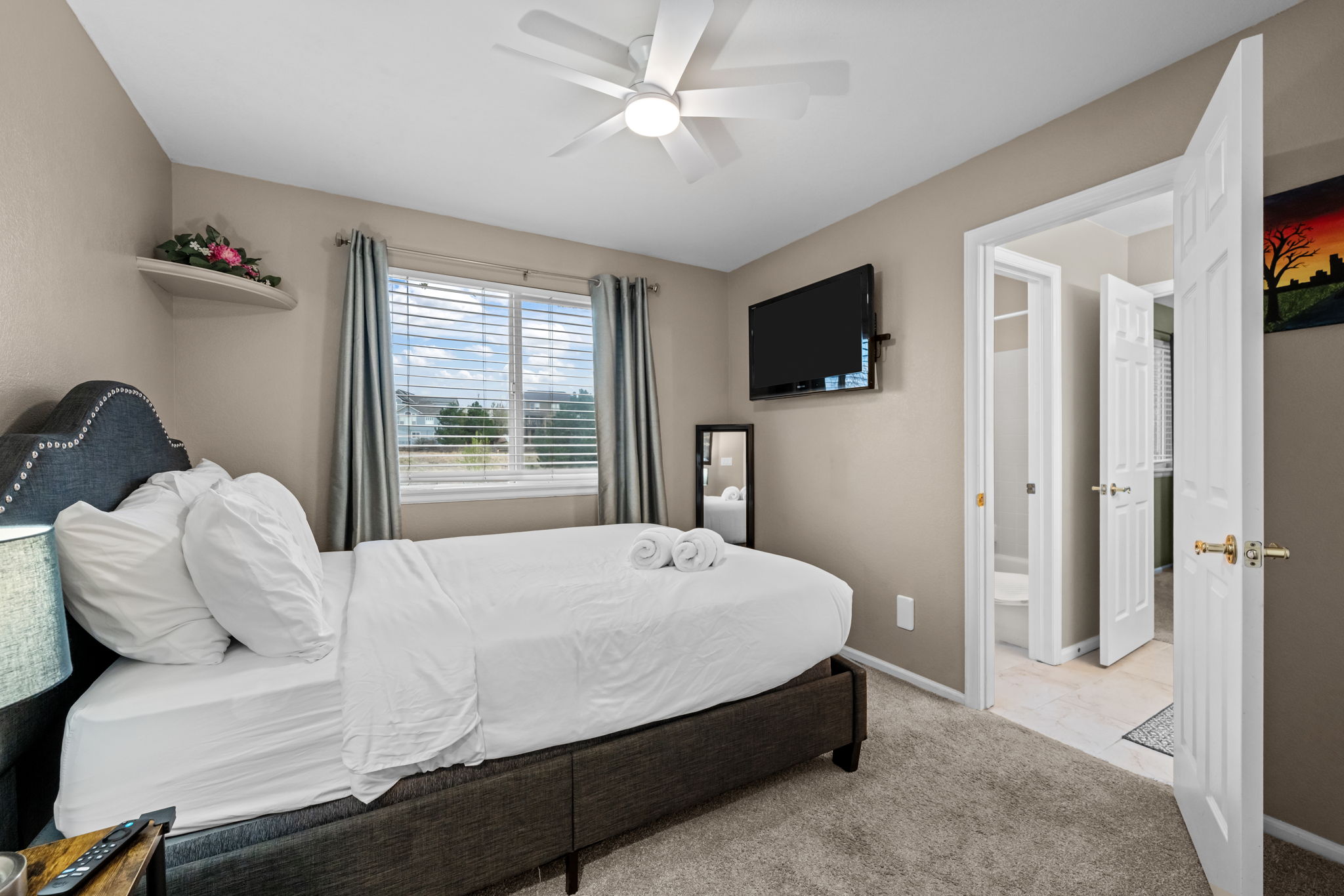 3rd upstairs bedroom, queen bed with TV, jack and jill bathroom