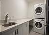 laundry room with brand new washer and dryer