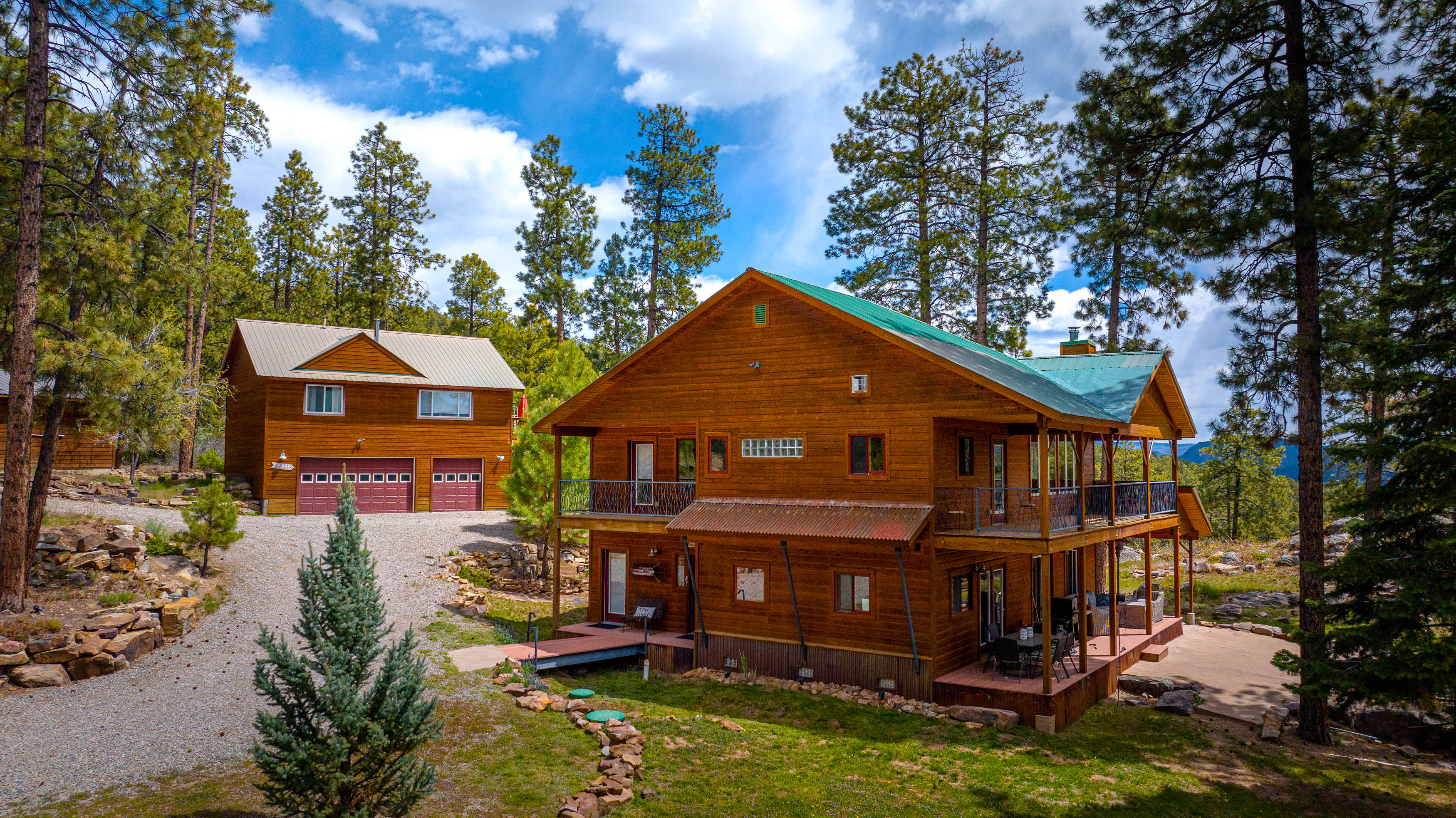Main house on the right and guest house on the left (note no garage access)