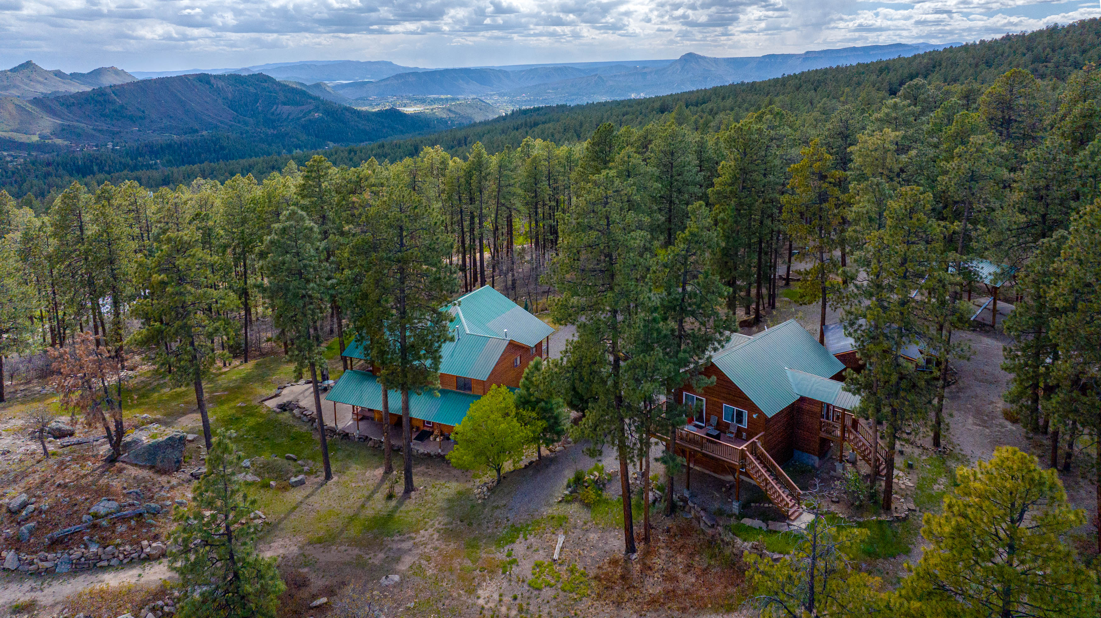 Main house on the left and guest house is on the right (note no garage access)
