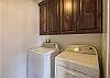 laundry room with full size washer and dryer