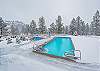 Outdoor Pool and Hot Tub in the Snow