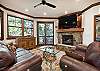 Living Room with Fireplace and TV