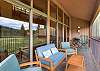 Deck includes outdoor seating and a BBQ grill.
