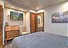 Relax and recharge in this cozy queen bedroom retreat on the main level