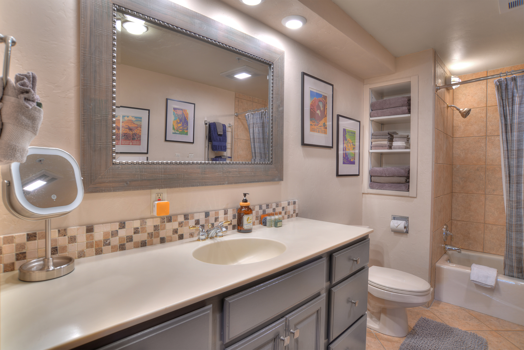 Clean and functional bathroom featuring a tub/shower combination.
