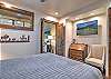 Relax and recharge in this cozy queen bedroom retreat on the main level