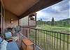Deck includes outdoor seating and a BBQ grill.