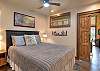 Relax and recharge in this cozy queen bedroom retreat on the main level