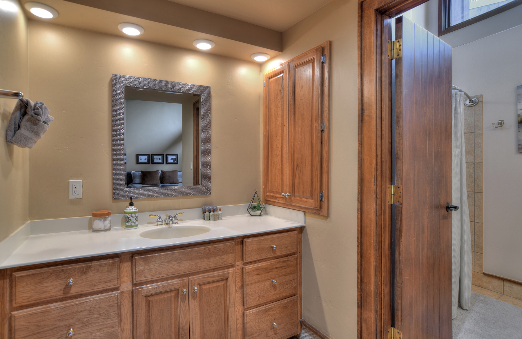 Full bathroom with convenient tub/shower combo and modern finishes.