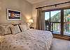 Master Bedroom - TV and Deck (slope views)