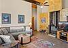Living room with wood burning stove and smart TV