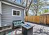 Outdoor Firepit and Seating Space in Fenced Yard