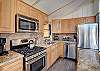 Fully equipped kitchen with granite countertops and gas range.  