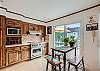 Fully Stocked Kitchen with Breakfast Table 