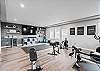 In Home Fitness Room - Workout Equipment, TV, Mini Fridge for Beverages, and Yoga Equipment