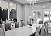 Dining Space - Seating for Ten (10) People with an Elegant Chandelier and Dining Set