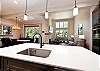 Kitchen - Overlook into Main Living and Dining Spaces