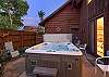 Enjoy the privet hot tub with a glass of wine at the end of your day.