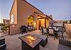 Plenty of patio seating, grill, couches and fire table. Large private hot tub!