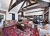 Open-Concept Layout with Stunning Views and Vaulted Ceilings and Exposed Wood Beams 