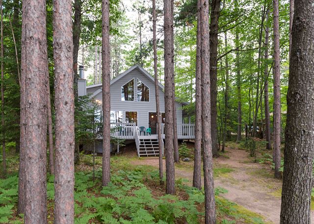 New Listing! Porch in the Pines | Lakehome w/ AC! Sandy Beach, Dock, Dogs OK