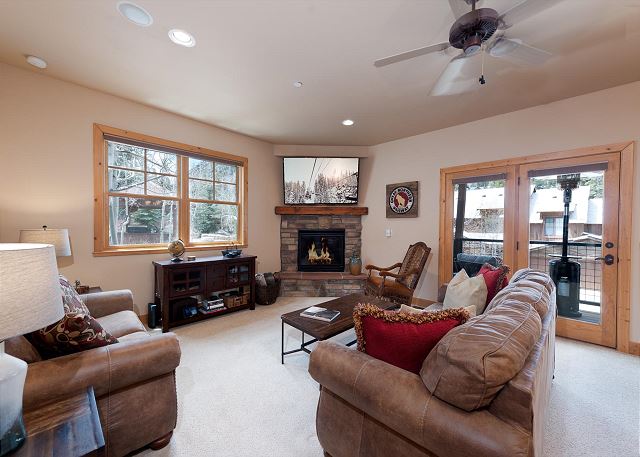 Main Living Space - TV, Gas Fireplace and Deck