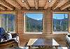 The large picture windows offer views of Nelson Mountain and East Willow. 