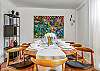 Room for everyone! Enjoy meals together at this elegant table for six