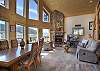 Peak Place open living room, dining and kitchen.