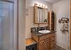 Downstairs bathroom with tub/shower combo.