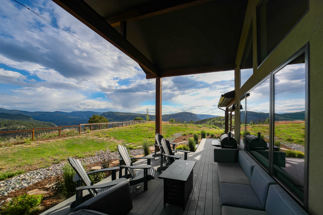 Covered outdoor space - Awesome views, private hot tub, gas fire pit, couches etc.