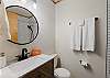 Ensuite bathroom with tub/shower combo off of second upstairs king bedroom 