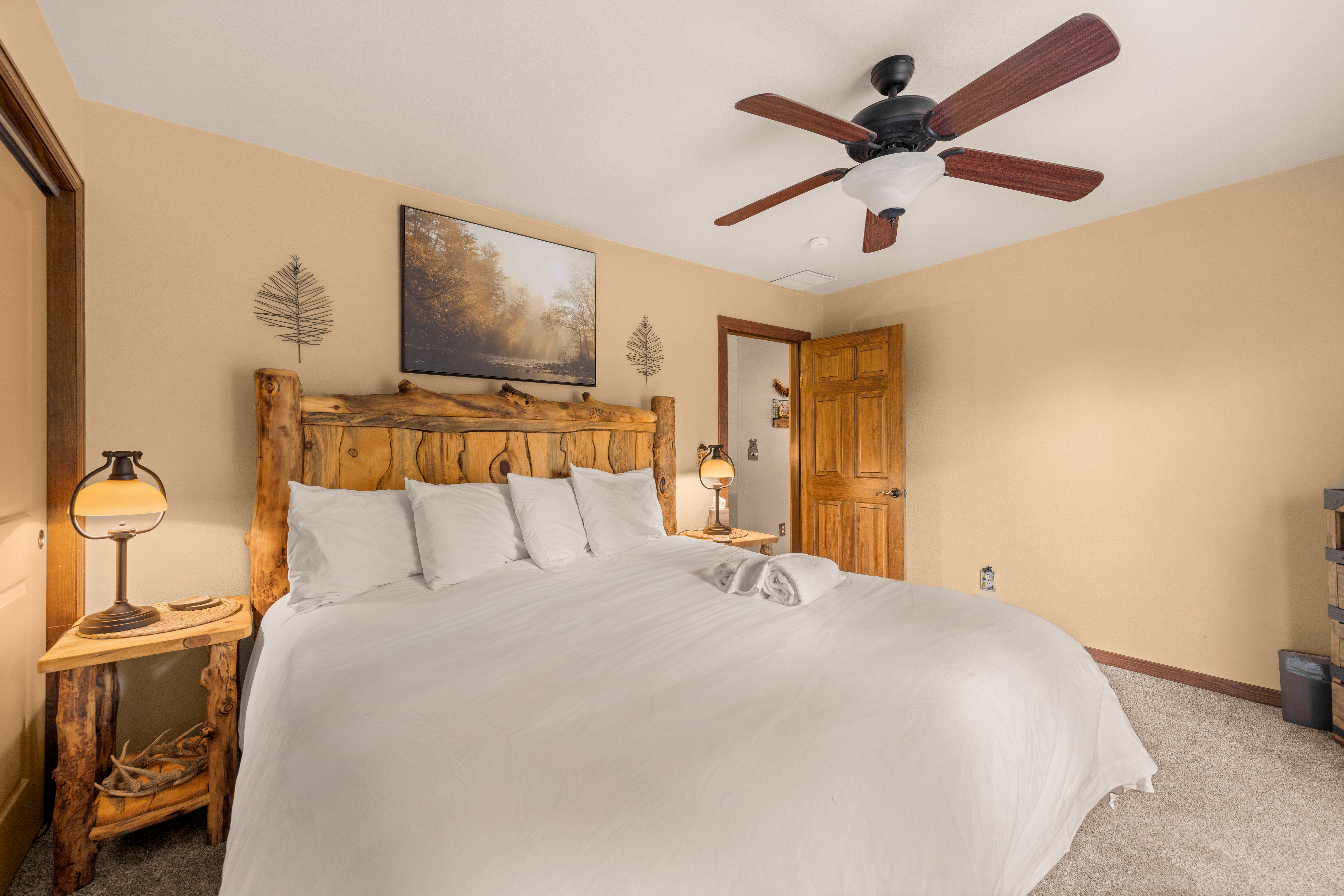 2nd Bedroom (Upper Level): King Bed with smart TV and private deck access